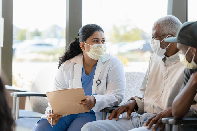 Doctor talking to patient